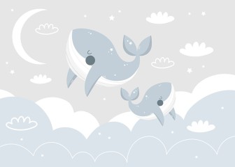 Urocze wieloryby w chmurach